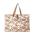 Floral canvas weekender bag with leather handles