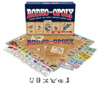 Rodeo-Opoly board game setup with board, cards, play money, dice, and six Western-themed tokens