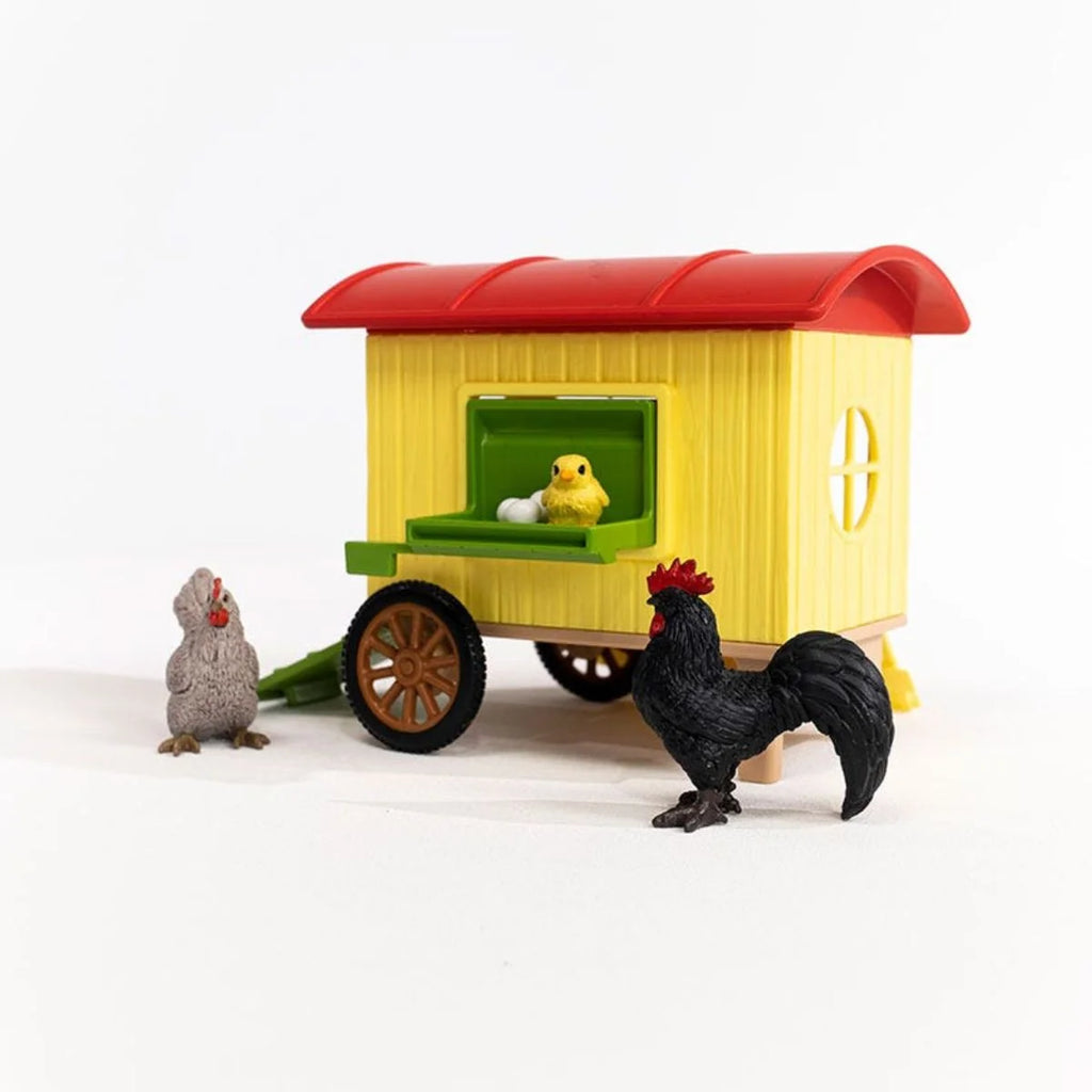 Side view of Schleich Mobile Chicken Coop with hen, rooster, and chick