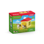 Schleich Farm World Friendly Dog House playset in its retail box, showing the dog house and two dog figures.
