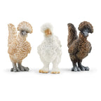 Three Schleich Chicken Friends figures in cream, white, and brown