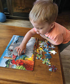 Child assembling the Dwight's Ducks farm animal tray puzzle with colorful duck, rooster, barn, and fence pieces