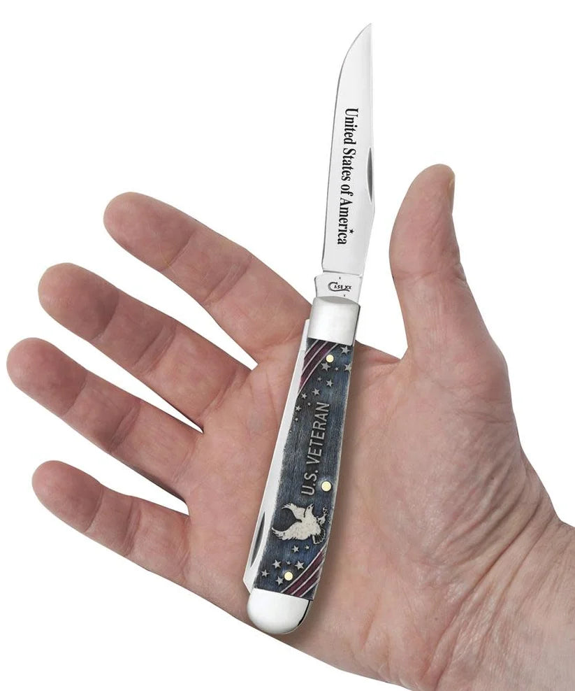 Case U.S. Veteran Natural Bone Trapper knife shown open in hand