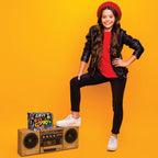 Woman posing with 80s and 90s Trivia Game beside a retro boombox