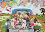 Country Road tray puzzle showing a flower-filled vintage truck on a country road with puppies and farm scenery