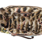 Western-inspired patchwork travel bag with spacious interior