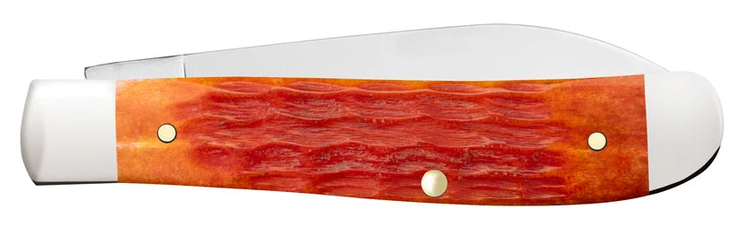 Reverse side of closed Case Tequila Sunrise Bone Mini Trapper with orange-red jigged handle