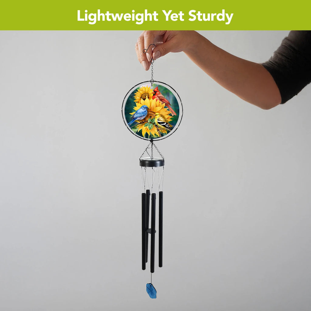 Briarwood Lane Birds in the Garden wind chime held by its hook, with bird and sunflower glass artwork and black chimes.