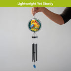 Briarwood Lane Birds in the Garden wind chime held by its hook, with bird and sunflower glass artwork and black chimes.
