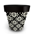 Briarwood Lane Geometric Floral Large Planter with cream floral patterns on a black pot.