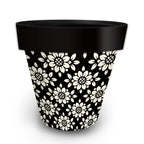 Briarwood Lane Geometric Floral Large Planter with cream floral patterns on a black pot.