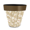 Medium Briarwood Lane planter with white flowers, red accents, a tan background, and a brown rim.
