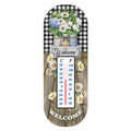 Crated Mason Jars metal thermometer with flowers in jars, a checked border, Welcome lettering, and dual temperature scales.
