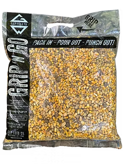 Triple Grip deer feed in a clear bag showing the corn and feed mixture.