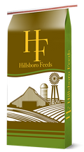 Hillsboro Feeds bag with a barn, silo and windmill illustration on green, white and brown packaging.