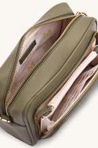Structured burnt olive camera bag with dual zippered compartments