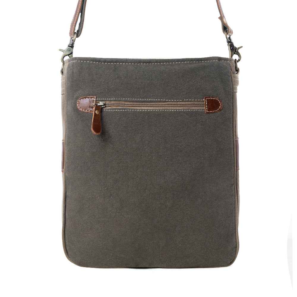 Back view of Myra Blossom Print Shoulder Bag with gray upcycled canvas and exterior zipper pocket