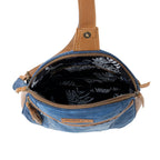 Interior of Myra Bluejean denim fanny pack S-14543 with patterned lining and zippered compartments