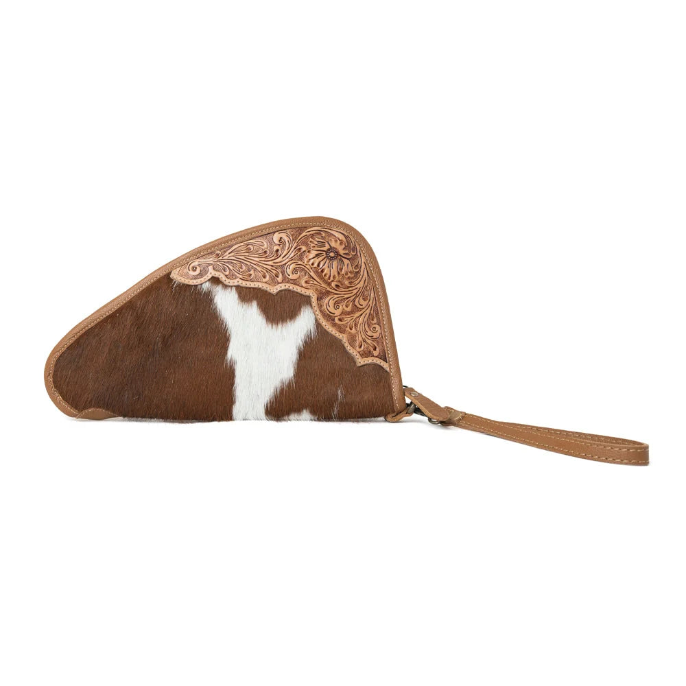Side view of Myra Cinder Oak gun case featuring brown and white hairon leather and handtooled leather