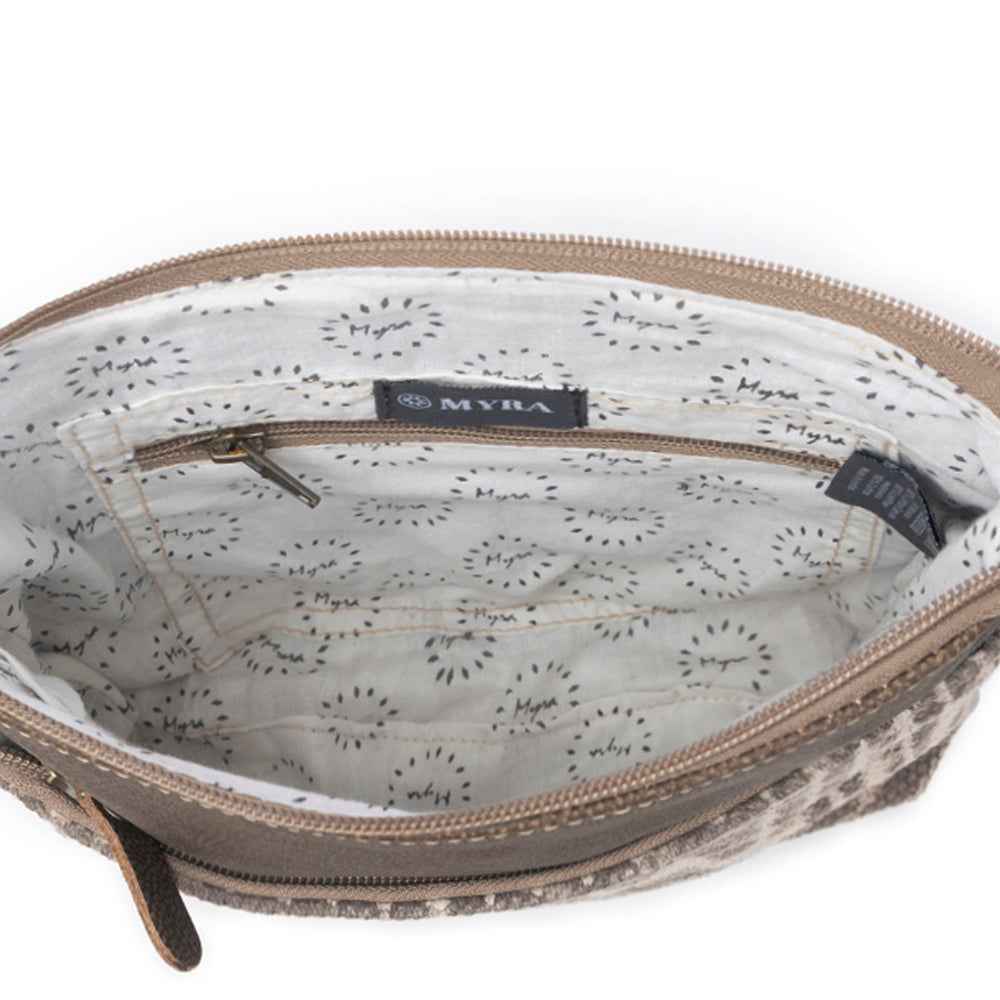Interior view of Myra Coffee Canvas Crossbody Bag with patterned cotton lining and interior zipper pocket