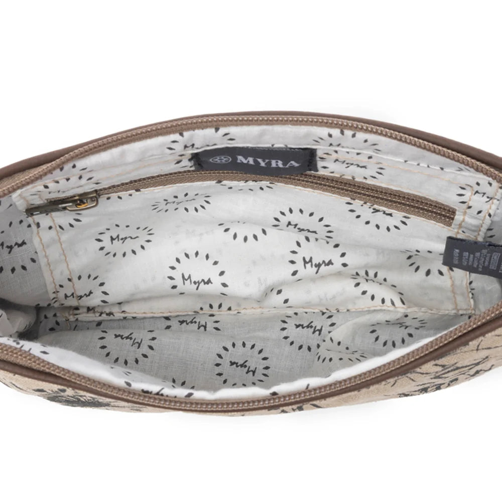 Interior of Myra Dainty Delight crossbody bag with patterned lining and zipper pocket