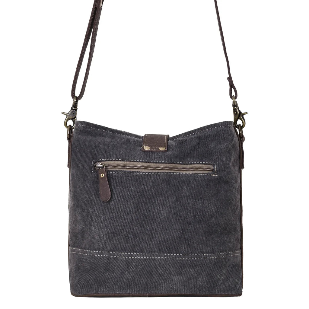 Back view of Myra Debonair Floral Shoulder Bag with dark upcycled canvas and exterior zipper pocket
