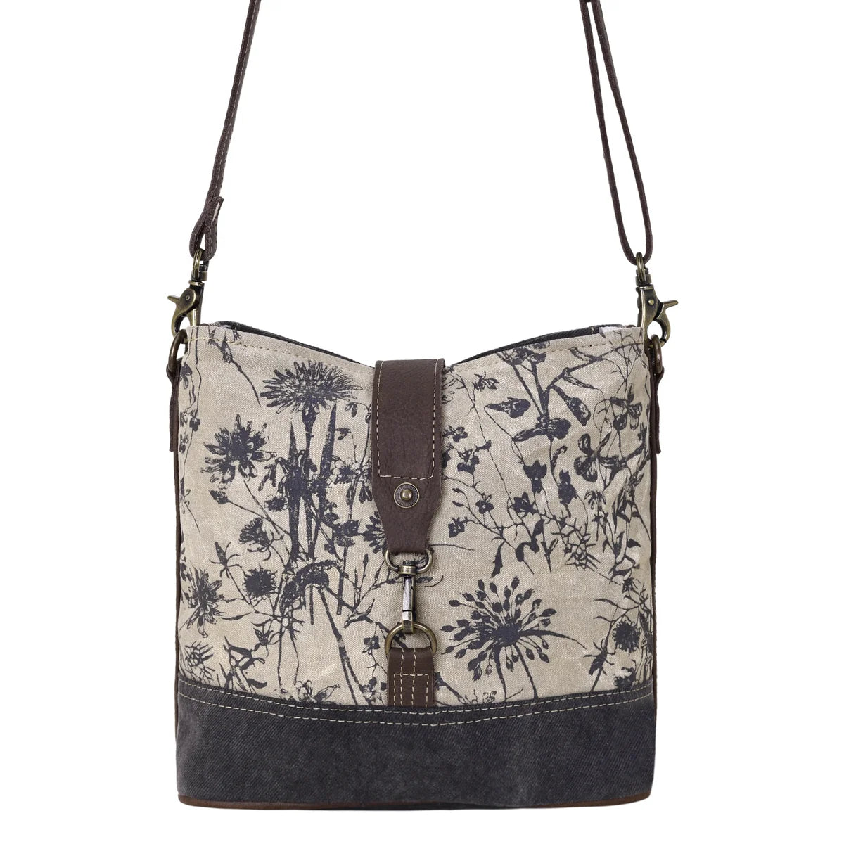 Front view of Myra Debonair Floral Shoulder Bag with botanical print canvas, dark canvas base and leather accents