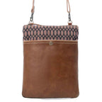 Myra Honey Bee Print small crossbody bag with brown leather front pocket and patterned canvas.