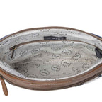 Interior view of Myra Itsy Bitsy Crossbody Bag with patterned cotton lining and interior zipper pocket