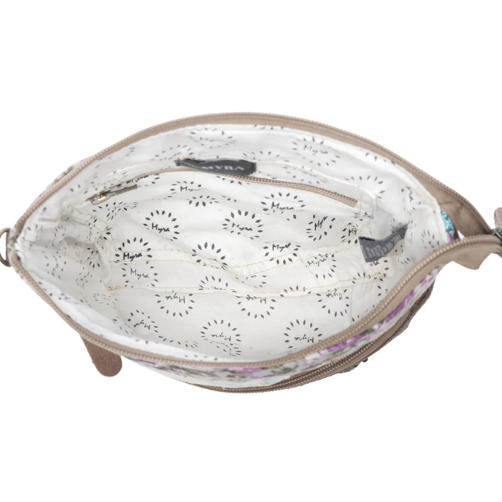 Interior view of Myra La Fleur Patchwork Crossbody Bag with patterned lining and interior zipper pocket