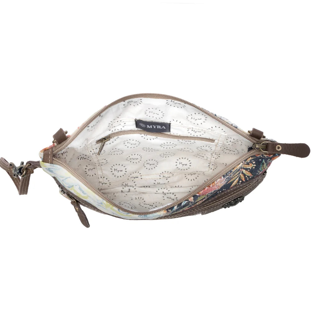 Interior view of Myra Le Piccolo Crossbody Bag with patterned cotton lining and interior zipper pocket
