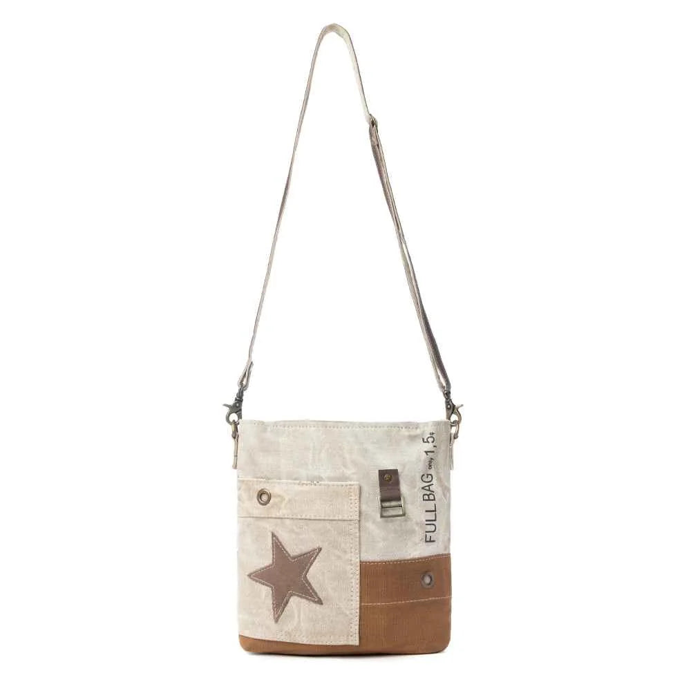 Full view of Myra Leather Star Crossbody Bag with leather star detail and adjustable crossbody shoulder strap