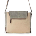 Back view of Myra Leather Star Shoulder Bag with beige and green canvas and exterior zipper pocket