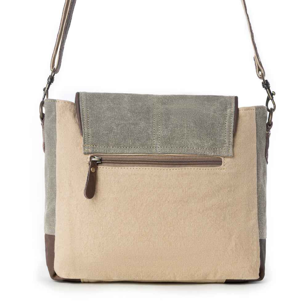 Back view of Myra Leather Star Shoulder Bag with beige and green canvas and exterior zipper pocket