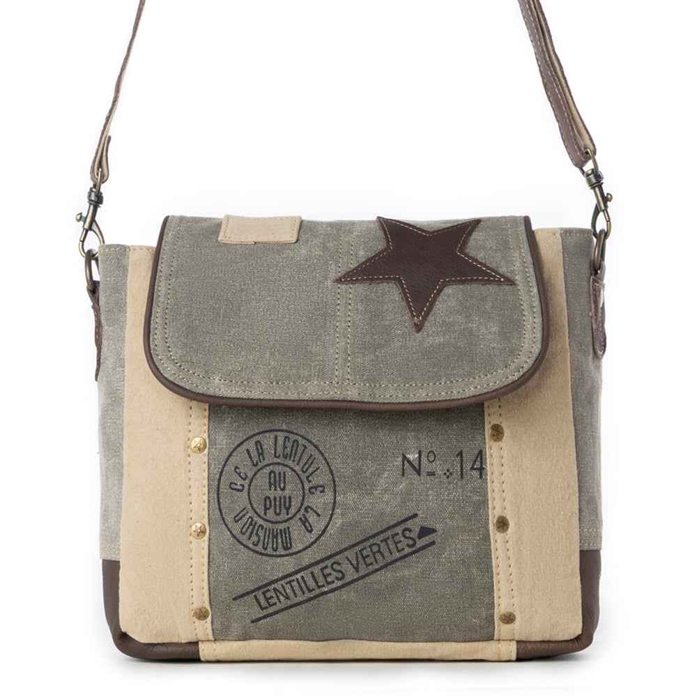Front view of Myra Leather Star Shoulder Bag with green and beige canvas, brown leather star detail and printed accents