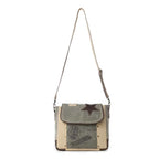 Full view of Myra Leather Star Shoulder Bag with leather star detail and adjustable shoulder strap