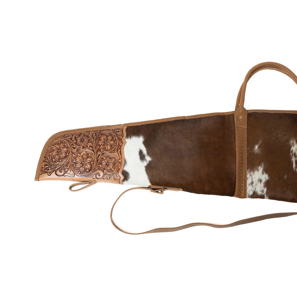 Myra Redstone Divide 52-inch gun case featuring Western hand-tooled leather and natural hair-on hide
