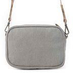 Back view of the Myra Temptation Tribal Crossbody Bag featuring gray upcycled canvas and an adjustable leather strap.