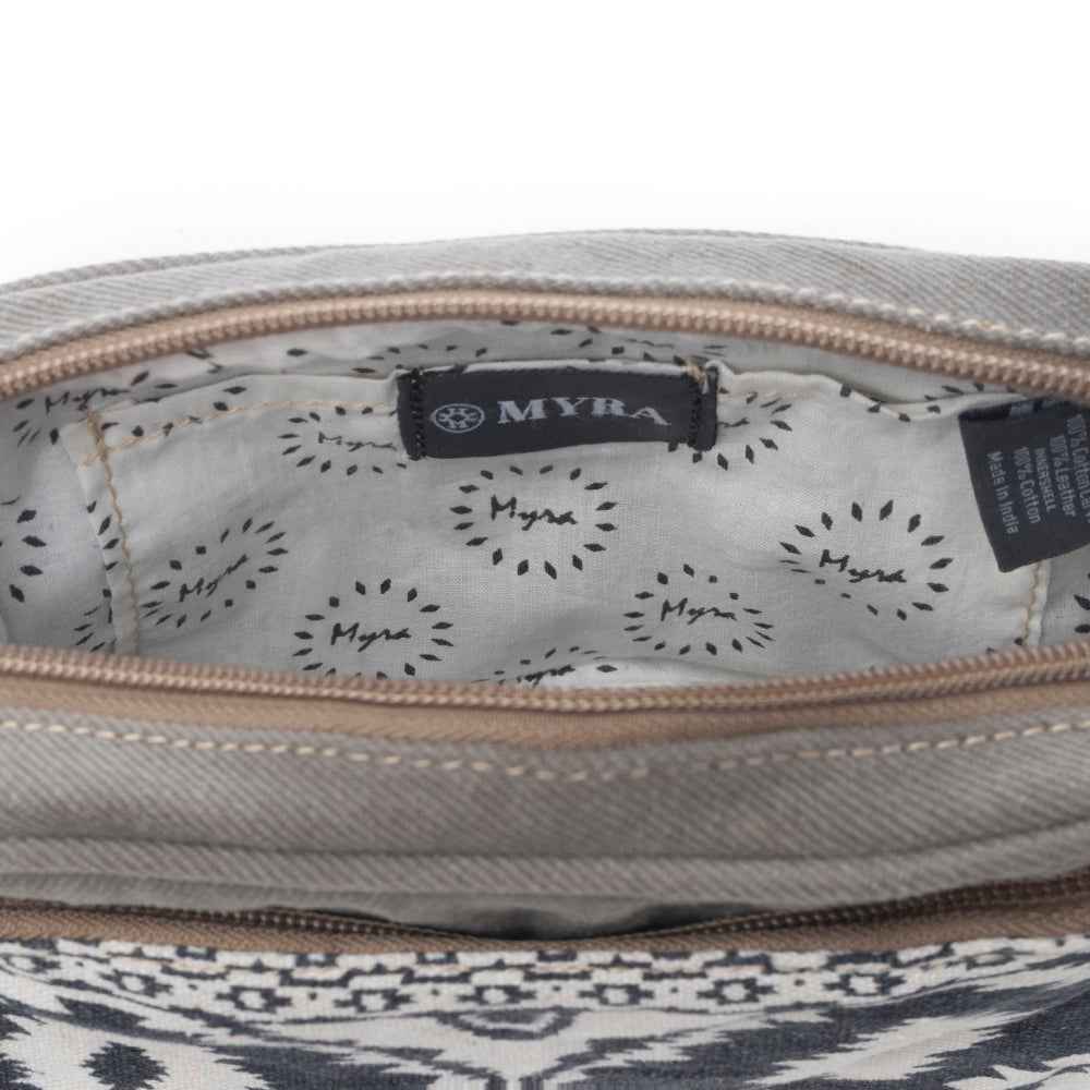 Interior view of the Myra Temptation Tribal Crossbody Bag showing the patterned cotton lining and zipper opening.