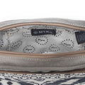 Interior view of the Myra Temptation Tribal Crossbody Bag showing the patterned cotton lining and zipper opening.