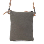 Back view of Myra Vuierra Rivet crossbody bag with dark upcycled canvas