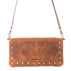 Amber leather clutch with decorative stud accents