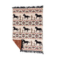 Chisholm Trail throw with black horses, cactus, geometric patterns, and black fringe on a cream background.