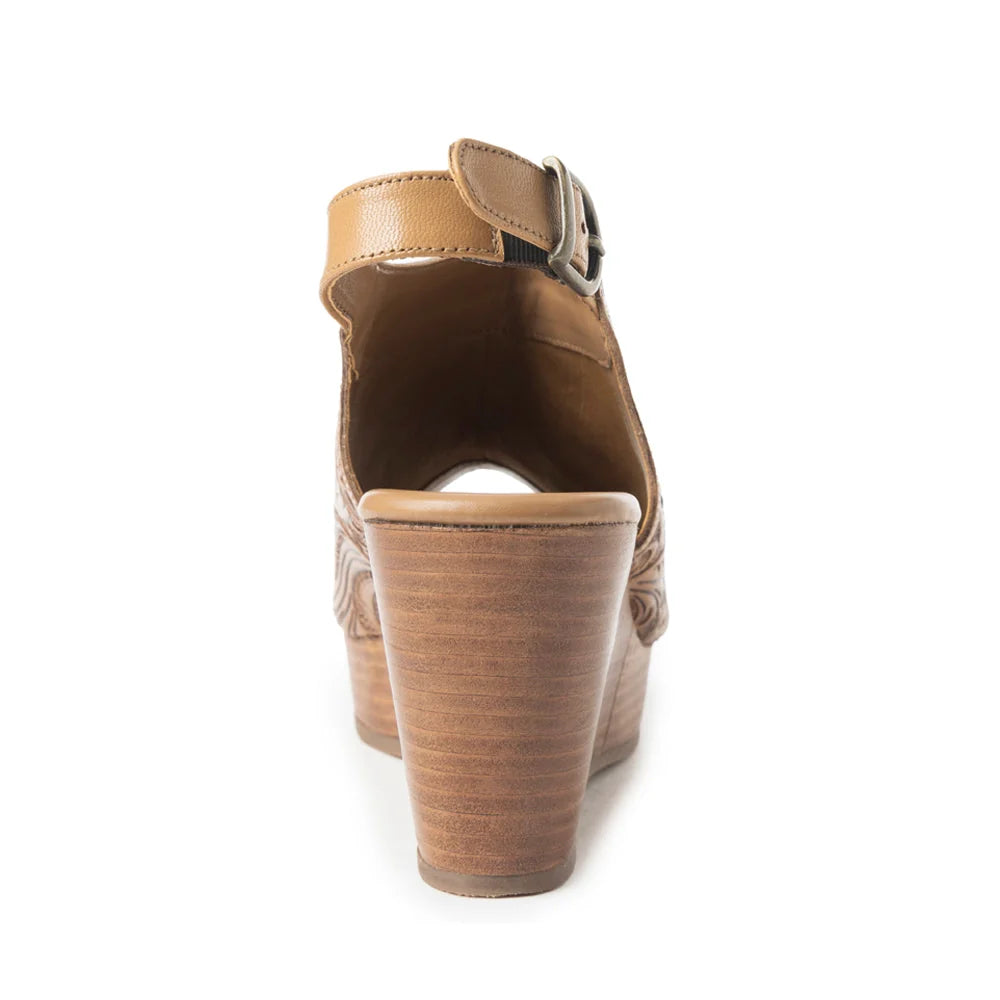 Rear view of Myra tan leather wedge sandal showing the wedge heel and adjustable buckle strap.