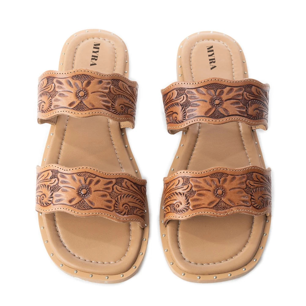 Myra Santa Fe Daisy tan leather sandals with floral-tooled straps and studded trim, shown from above.