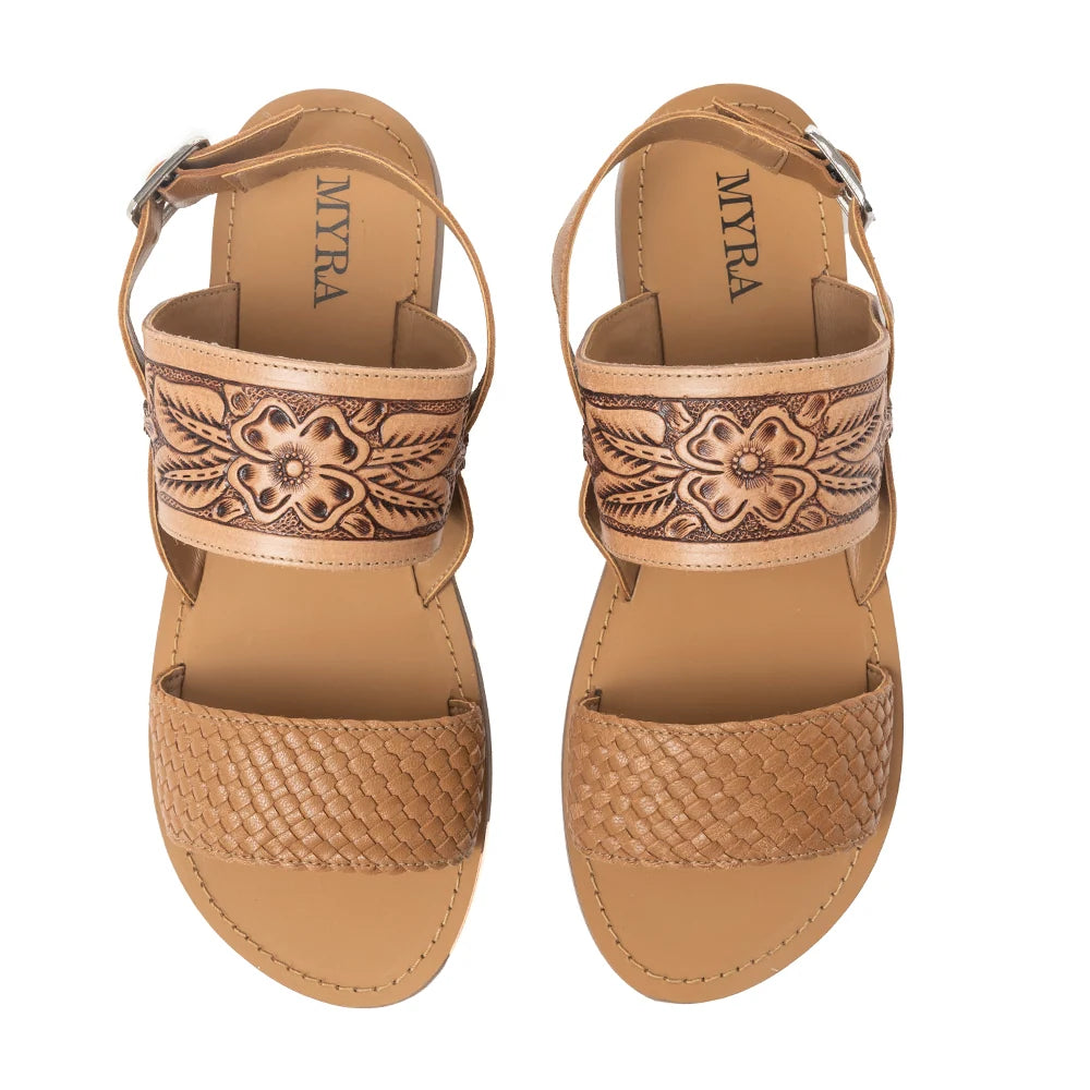 Myra Pinehorn brown leather sandals with floral hand-tooled straps and woven-texture toe straps.