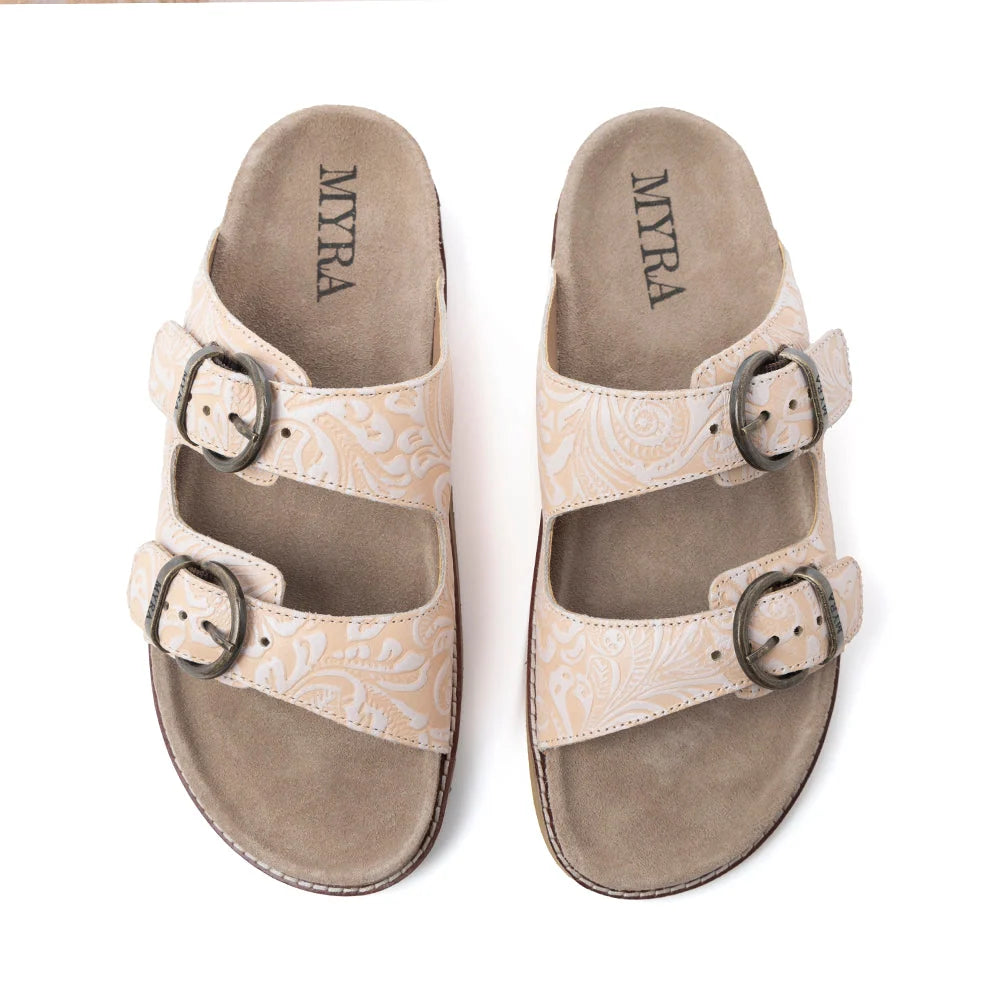 Myra Desert Lily Antique White embossed leather sandals with double buckle straps.