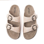Myra Desert Lily Antique White embossed leather sandals with double buckle straps.
