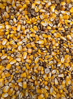 Close-up of Triple Grip deer feed with yellow corn kernels and brown feed pieces