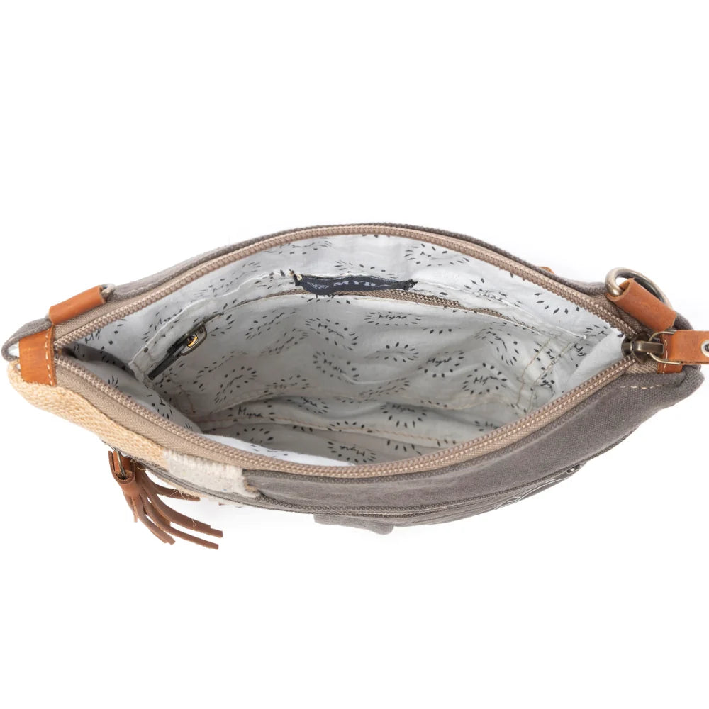 Interior view of USA Canvas Patch Crossbody Bag S-8050 with patterned cotton lining and interior pockets